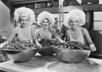 Three ladies taking charge of Food Portions